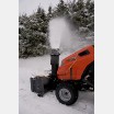 Pavement snow blower